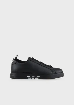 Black leather sneakers with mesh insert.