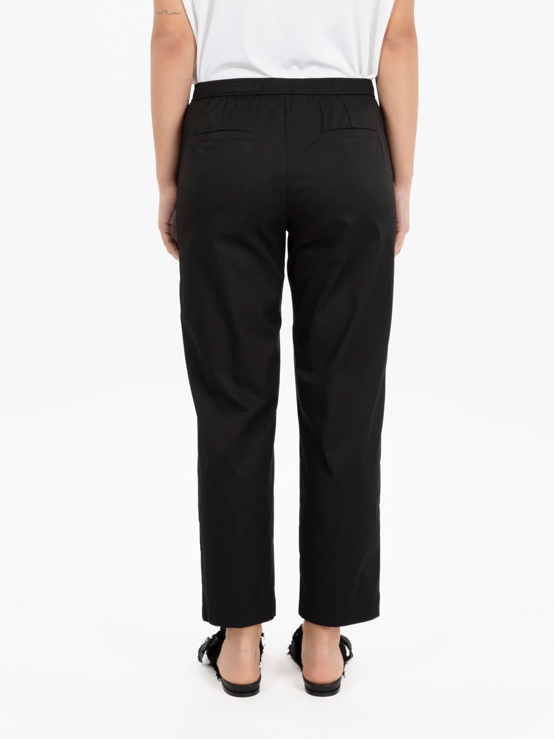 Black straight-cut cotton trousers.