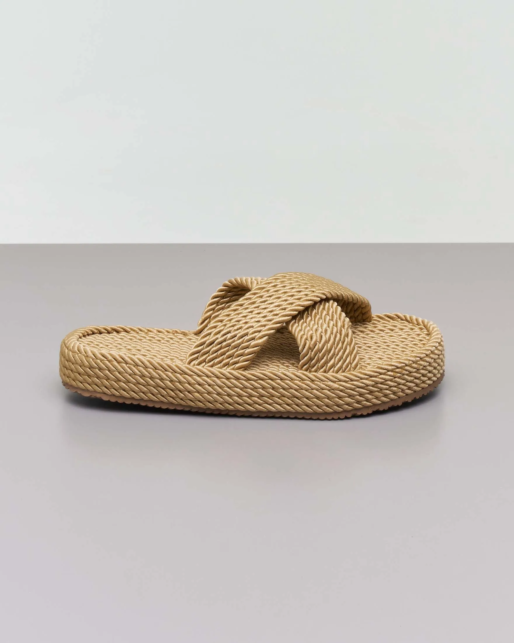 Camel braided rope sandals with high crisscross strap sole.